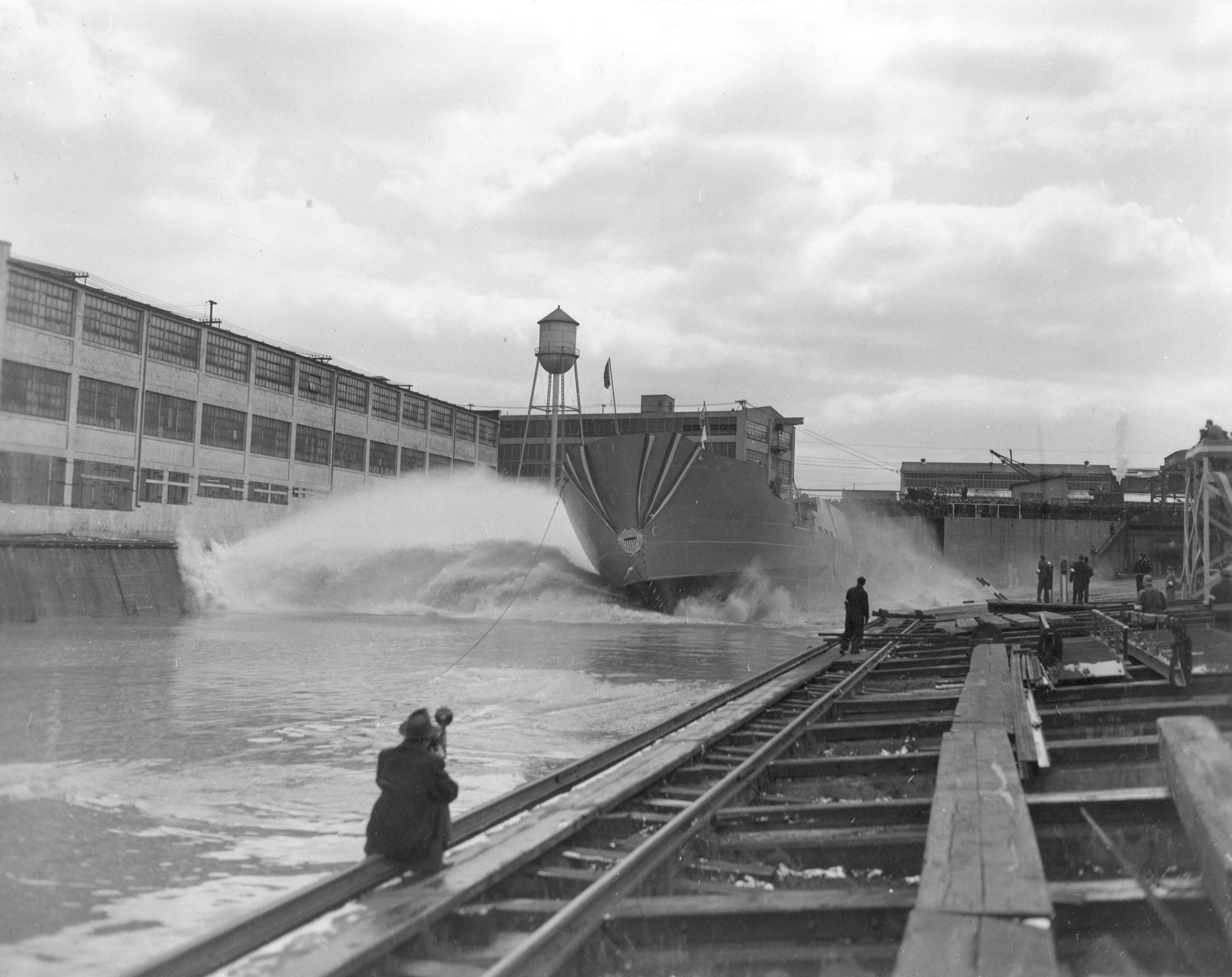 A local news photographer captures the moment the hull Storis was side launched at the Toledo (Ohio) Shipbuilding Company. (U.S. Coast Guard) A local news photographer captures the moment the hull Storis was side launched at the Toledo (Ohio) Shipbuilding Company. (U.S. Coast Guard)